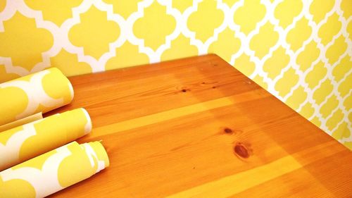 Close-up of yellow hardwood on table