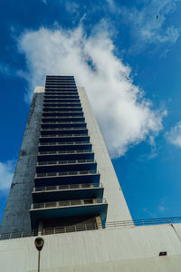 Low angle view of building against blue sky