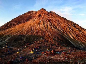 Scenic view of volcanic mountain against sky