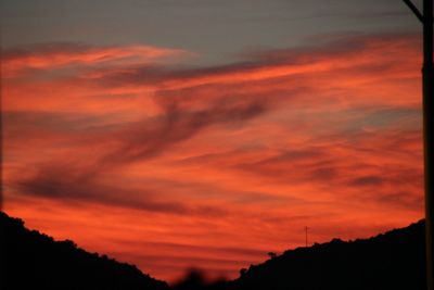 Scenic view of dramatic sky during sunset