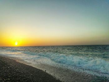 Scenic view of sunset over sea