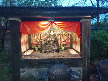 Statue against temple