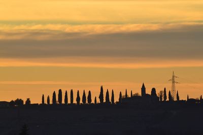 Silhouette of buildings during sunset