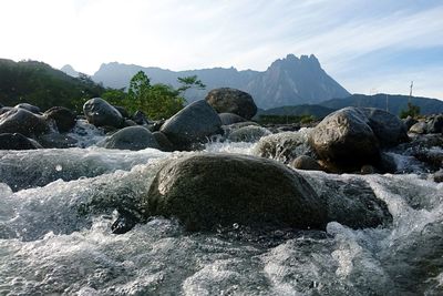 Scenic view of rocks against sky