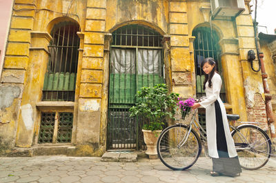 Bicycles parked against building