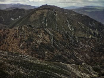 Scenic view of rocky mountains against sky