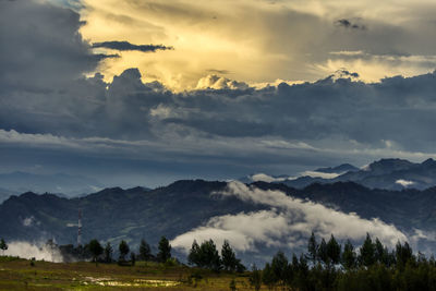 Scenic view of mountains against sky during sunset