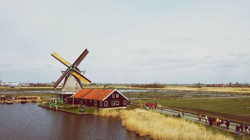 Traditional windmill against sky