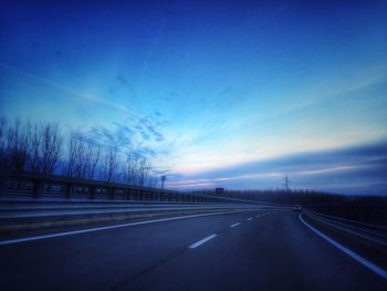 Road against blue sky