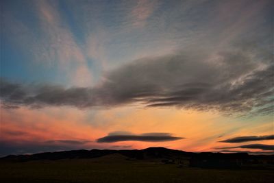 Scenic view of dramatic sky during sunset