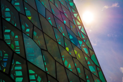 Architecture close-up and detail of the glass window design of the harpa concert hall