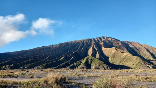 Scenic view of mountain range against sky