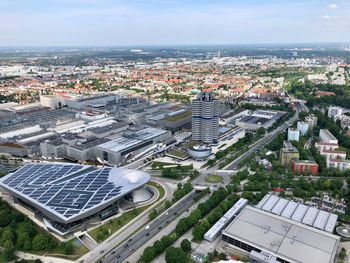 High angle view of city buildings against sky