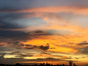 Low angle view of dramatic sky during sunset
