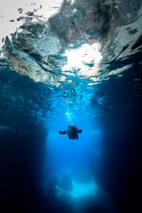 View of person swimming in sea