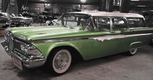 Vintage car parked on street in city