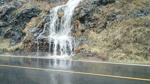 Close-up of water flowing over road