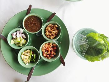 High angle view of fruits served on table