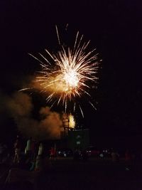 Firework display at night