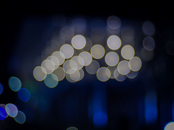 Defocused image of illuminated christmas lights