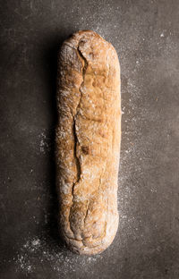 Close-up of bread against black background