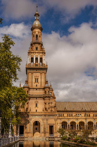 Low angle view of historical building against sky. plazz de espana at sevilla, church