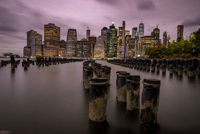 Panoramic view of buildings in city at dusk