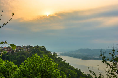 Scenic view of sea against sky at sunset