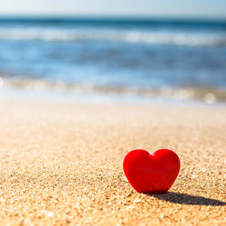 Heart shape on sand at beach