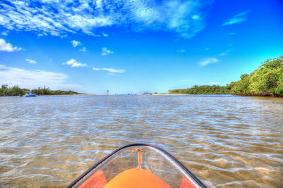 Scenic view of lake against blue sky