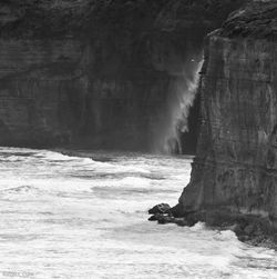 Scenic view of rock formation in sea
