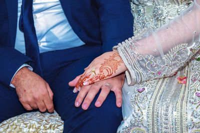 Midsection of woman with hands