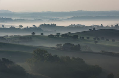 Scenic view of landscape against sky during sunset