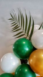 Close-up of multi colored balloons balls on table