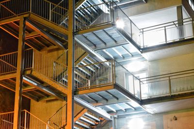 Low angle view of spiral staircase in building