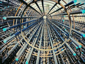 Directly below shot of metallic structures at construction site