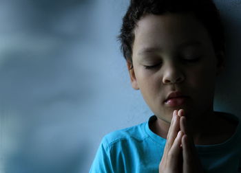 Close-up of boy looking away