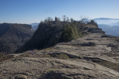 Scenic view of rocky mountains against clear sky