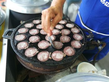 High angle view of person preparing food