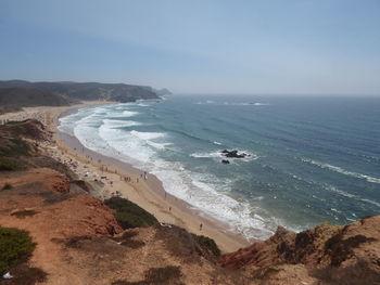 Scenic view of beach against clear sky