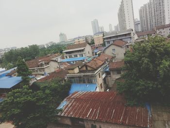 View of buildings in city against sky