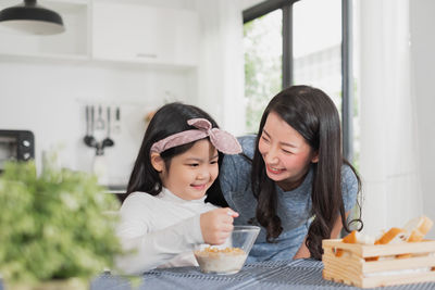 Happy mother and daughter