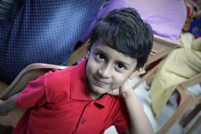 Portrait of smiling boy sitting