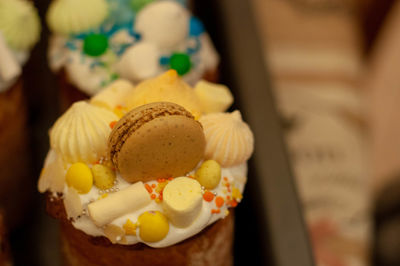 Close-up of cupcakes on cake