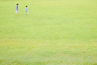 People walking on field