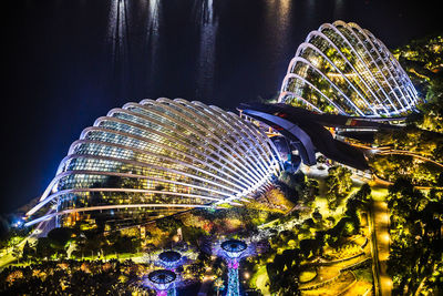 Illuminated ferris wheel at night