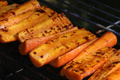 High angle view of meat on barbecue grill