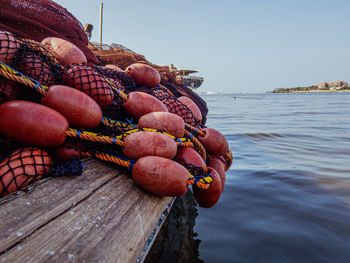 Fishing net on a boat at sea against clear sky