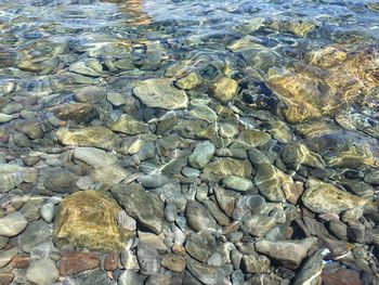 Full frame shot of pebbles on beach