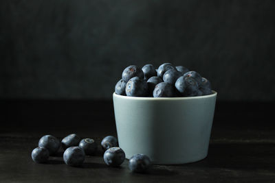 Close-up of roasted coffee beans on table